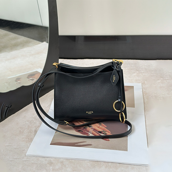 alaïa vertical le click mini clip crossbody handbag
